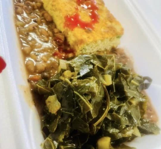 Take-out plate with collard greens, beans and cornbread